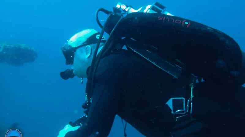 a man swimming in the water