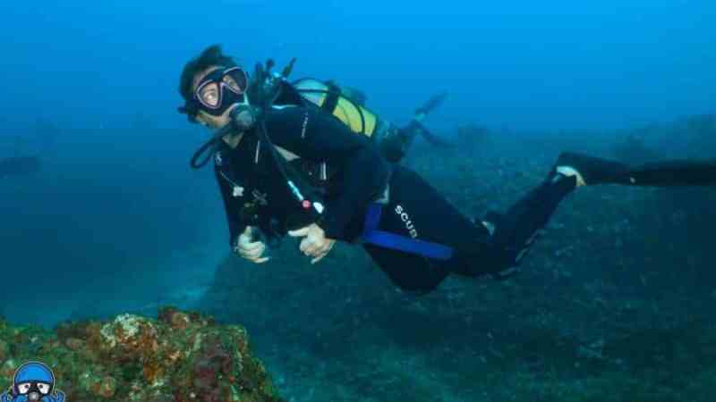 a man swimming in the water