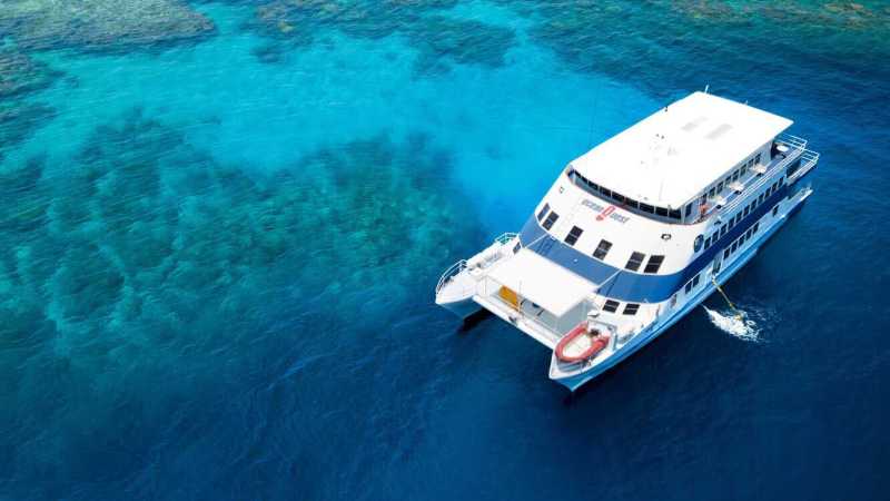 a small boat in a body of water