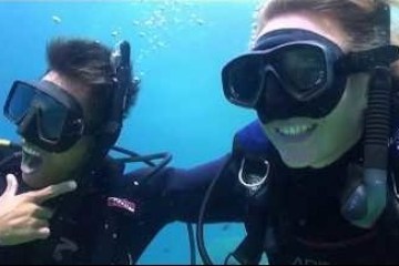PADI Advanced students smiling underwater