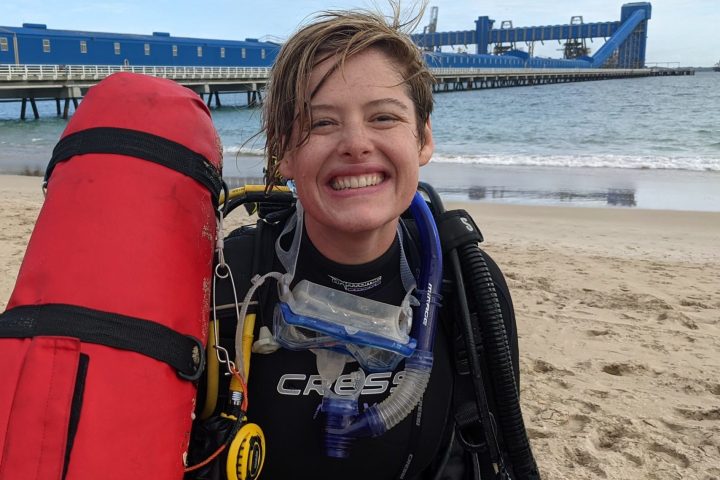 a scuba diver finishing her PADI course