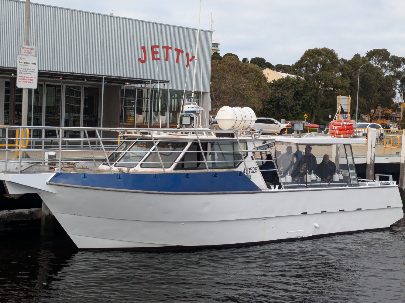 a boat is docked in the water