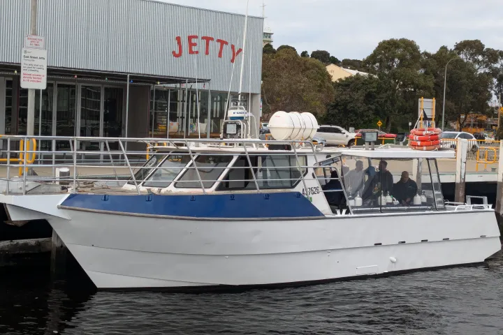 a boat is docked in the water