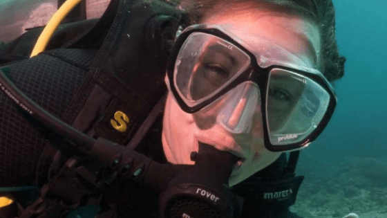 a person wearing sunglasses taking a selfie