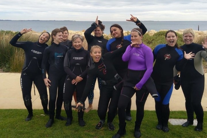 a group of people posing for a photo